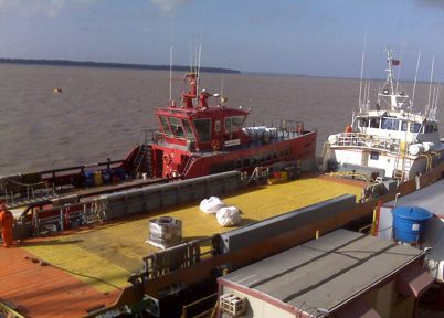 Supply vessels docked for marine logistics operations