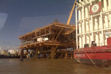 Offshore platform viewed from a support vessel at sea